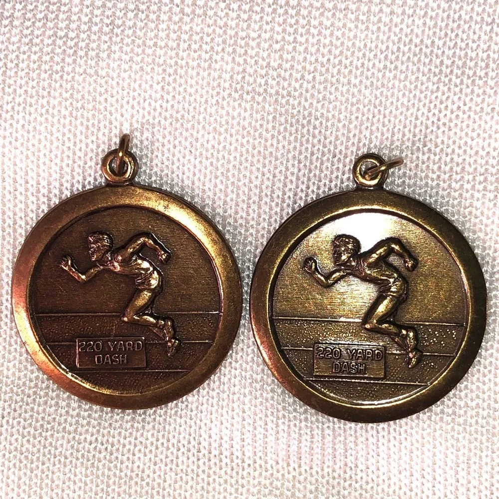 TWO 220 YARD DASH RUN PENDANTS BRONZE & BRASS TONE